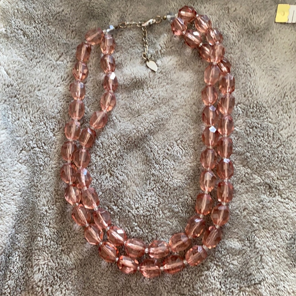 Light lilac beaded necklace.